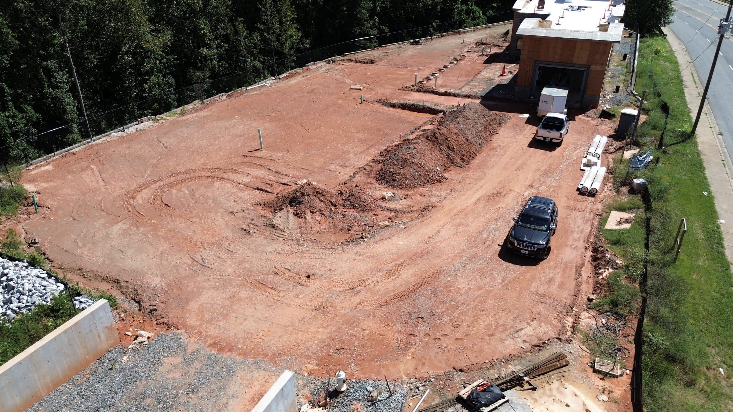 Site work, utilities, building shell.