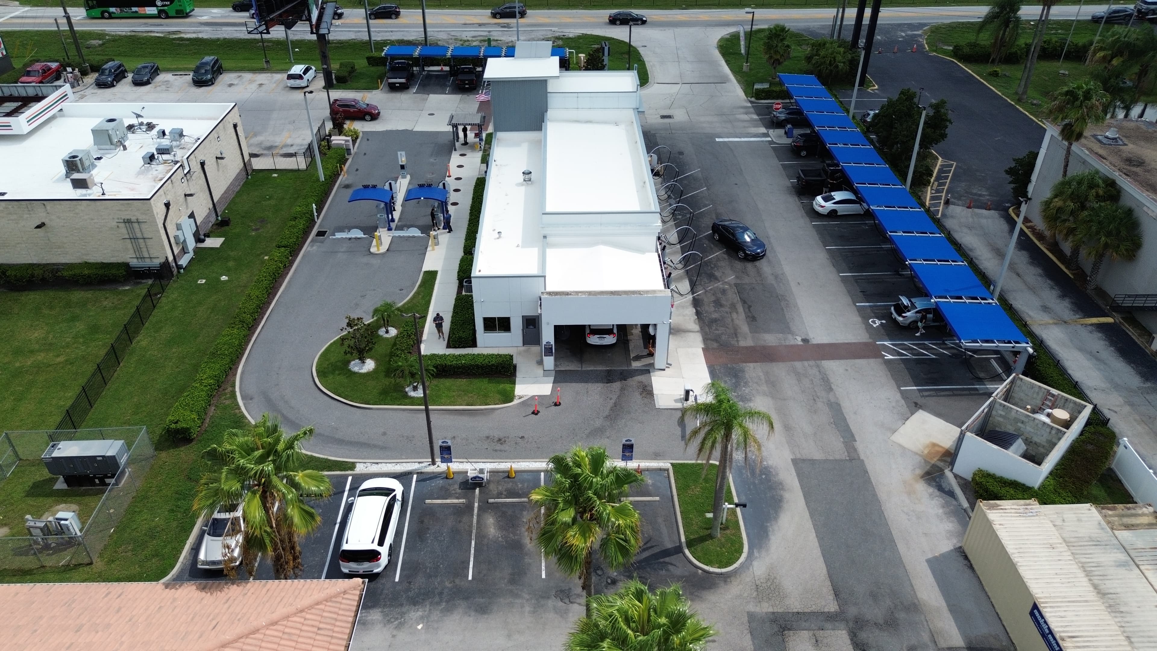 Express tunnel car wash with retail center context